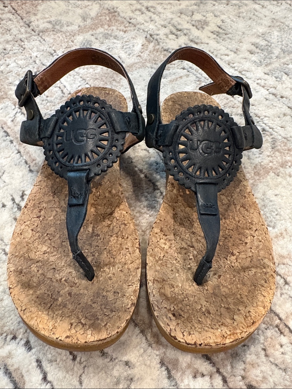 UGG Black Cork Footbed T-Strap Sandals with heel strap Medallion detail size 6.5